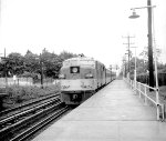 LI 604 heads west on the east end of the train.